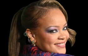 Rihanna with a sleek, curled-under lob haircut paired with chunky sunglasses.