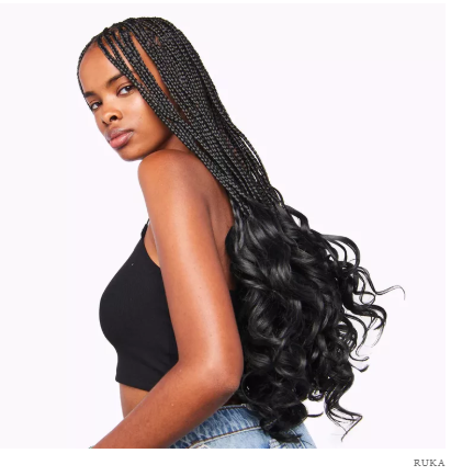 7 Healthier Braiding Hair Brands to Try Before Your Next Protective Style 2 A woman flaunting long, healthy braids made from non-toxic, eco-friendly braiding hair brands, showcasing shine, volume, and scalp comfort.