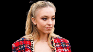 Sydney Sweeney stuns in a silver Anti-Bridal Corset at CinemaCon 2025, styled with a bold belt and soft glam beauty look.
