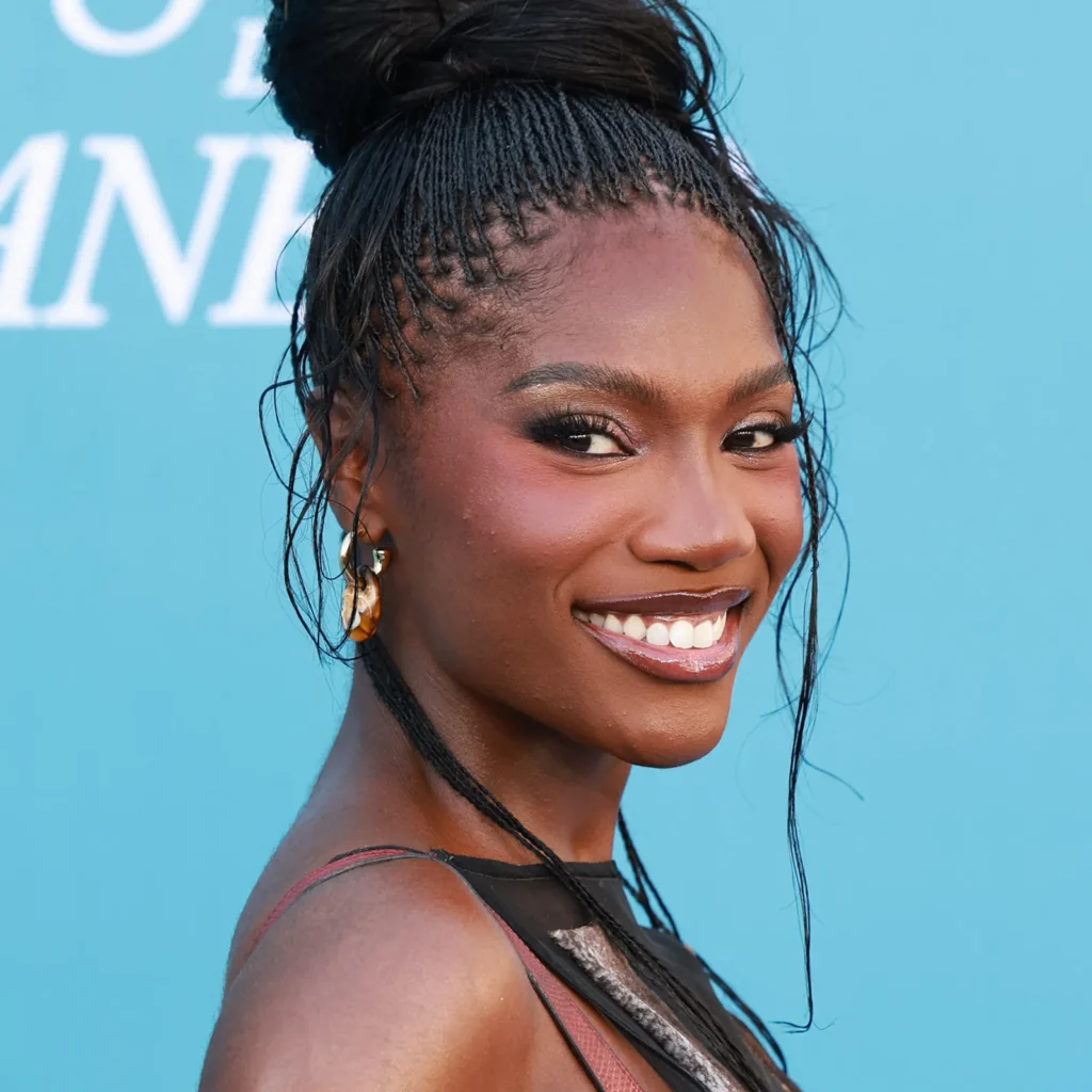 Doechii Switched to Micro Braids—Now the Internet’s Buffering! 1 Doechii stuns in micro braids at the Billboard Women in Music Awards, paired with a sheer gown and glowing makeup.
