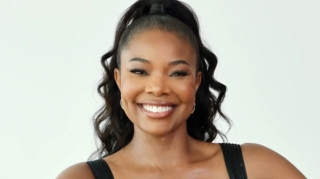 Gabrielle Union rocking a sleek three-braid ponytail on a boat with Dwyane Wade