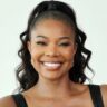 Gabrielle Union rocking a sleek three-braid ponytail on a boat with Dwyane Wade