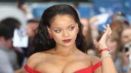Rihanna strutting in a scarf-as-skirt maternity look, redefi