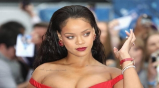 Rihanna strutting in a scarf-as-skirt maternity look, redefi