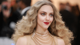 Amanda Seyfried red carpet photo, actress sparks debate with Charles Kirk remarks.