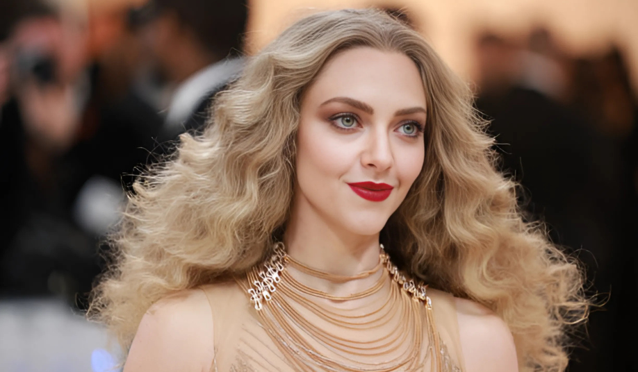 Amanda Seyfried red carpet photo, actress sparks debate with Charles Kirk remarks.