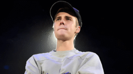 Justin Bieber posts cryptic “I Do” song amid Selena Gomez and Benny Blanco's wedding, sparking fan reactions and roasting on Instagram.