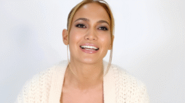 Jennifer Lopez flaunting vampy layered burgundy manicure at Kiss of the Spider Woman screening.