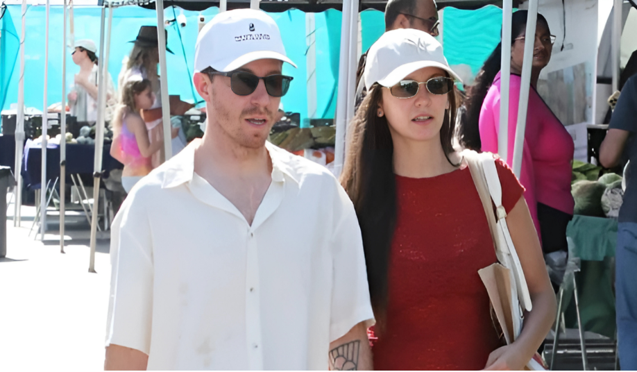 Nina Dobrev and Shaun White holding hands at LA farmers market before breakup.