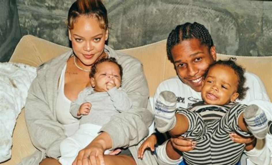 Rihanna & A$AP Rocky Welcome Baby No. 3 — Surprise, It’s a Girl! 1 Rihanna and A$AP Rocky holding newborn daughter Rocki Irish Mayers, with sons RZA and Riot smiling alongside them in a family photo.