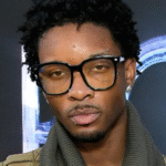 Concert photo of D4VD with eerie lighting and fans in the crowd, linked to ongoing Celeste Diva case.