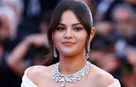 Selena Gomez smiling as she spots Martin Short texting Meryl Streep during the Emmys.