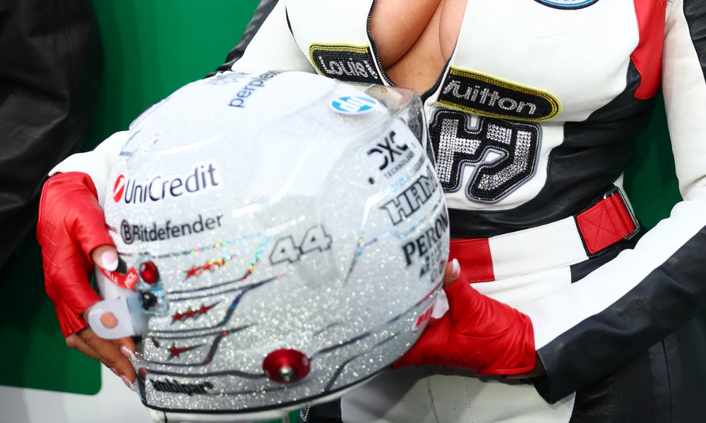 Beyoncé wearing a Louis Vuitton catsuit and showing a classic French manicure at the F1 Las Vegas Grand Prix.