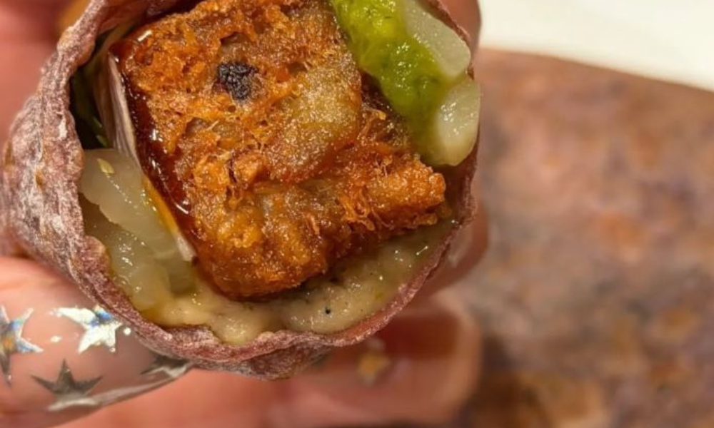 Dua Lipa’s Star Nails Are the Perfect Holiday Nail INSPO You Need 9 Dua Lipa showing peachy-pink nails with silver star accents, perfect holiday nail inspiration