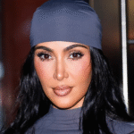 Kim Kardashian laughing while getting her hair styled after failing the California Bar Exam