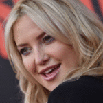 Kate Hudson showing medium-length navy blue aura nails with a soft blue gradient at the Song Sung Blue premiere