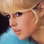 Brigitte Bardot portrait smiling with iconic hairstyle and makeup