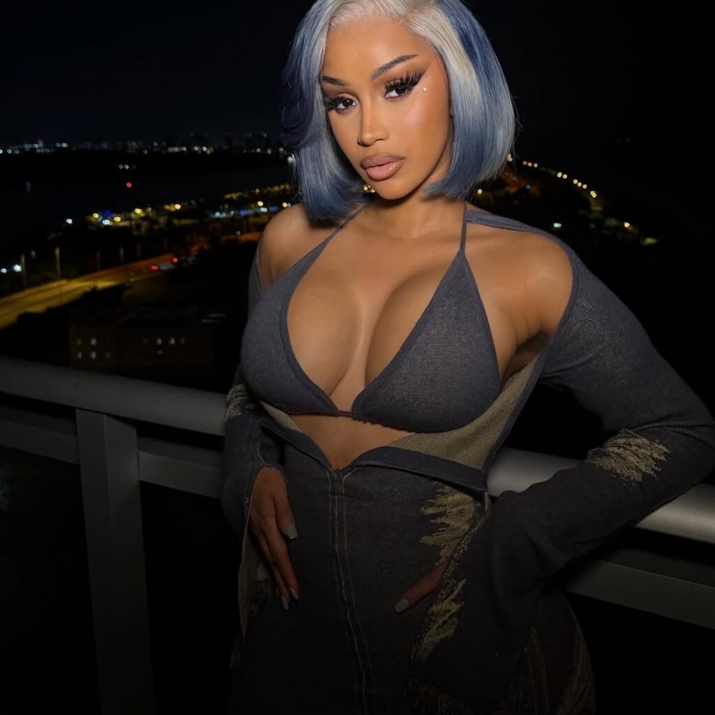 Cardi B's Blue Bob Is This Winter's Boldest Hair Inspiration 3 Close-up of Cardi B’s denim blue bob and glam makeup