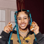 North West showing her latest dermal piercing on her hand in a viral Instagram post