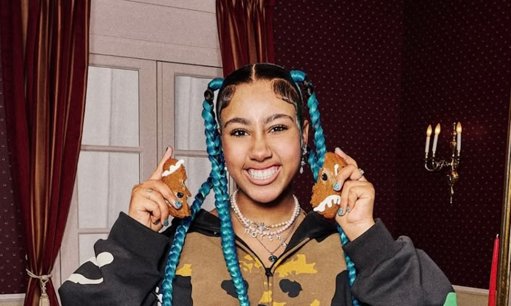 North West showing her latest dermal piercing on her hand in a viral Instagram post