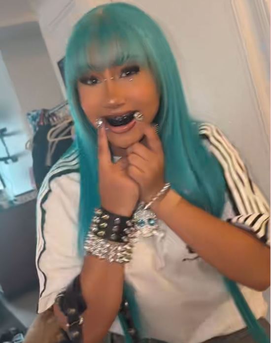 North West rapping in her new song with Kanye, showing piercings and tattoos