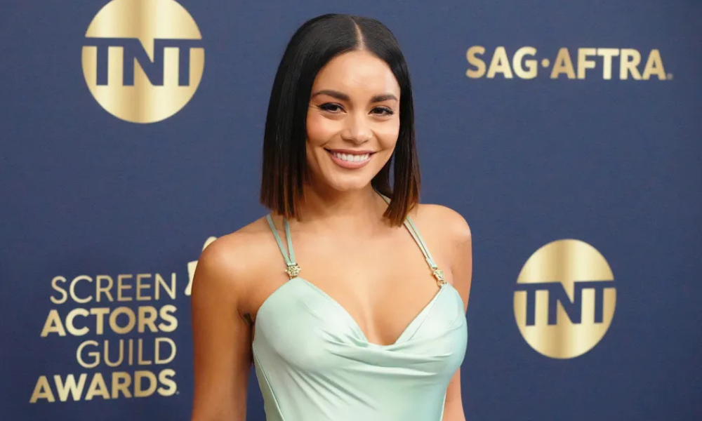 Vanessa Hudgens tiger stripe French manicure on long almond nails with chrome tips