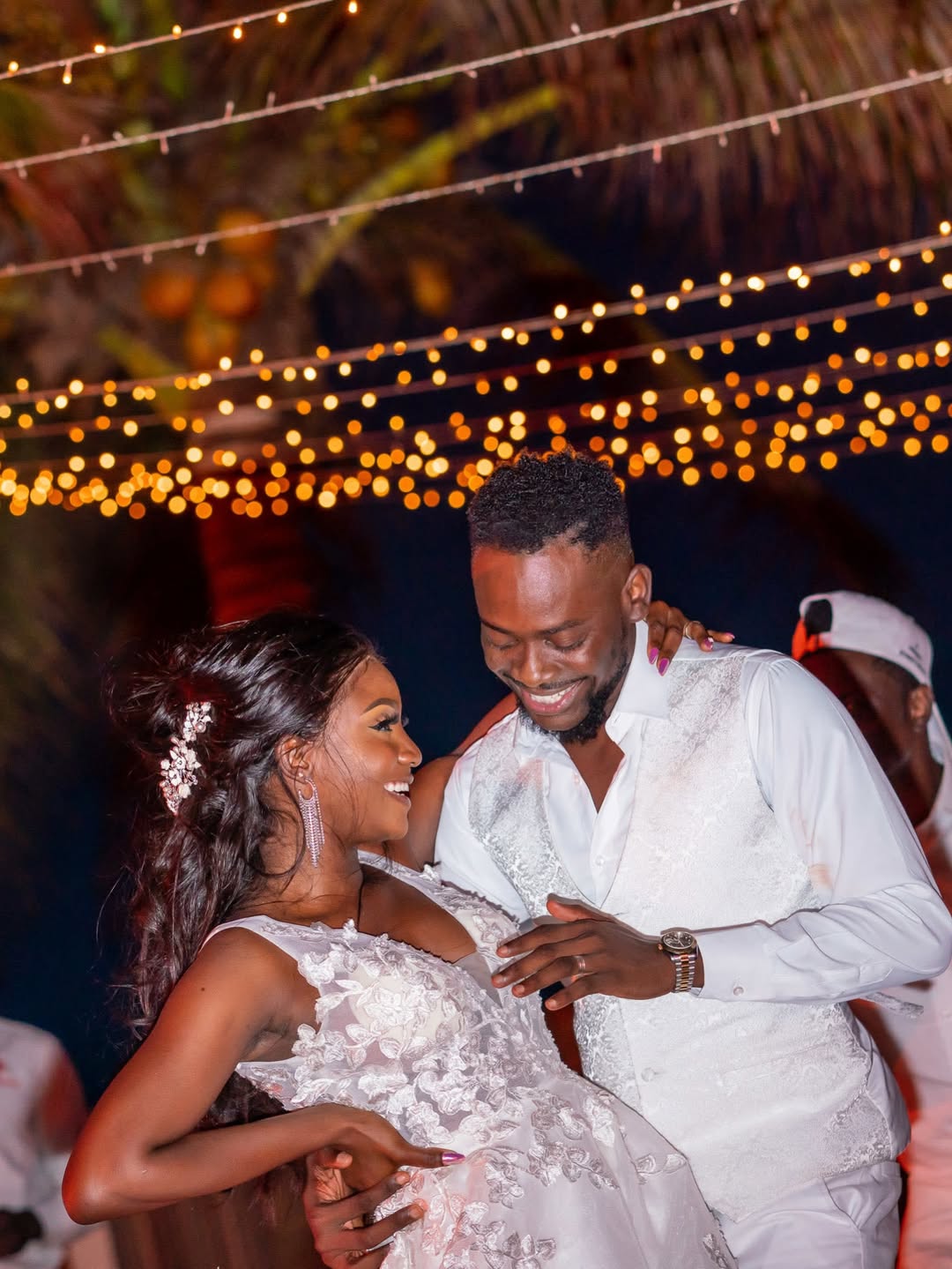 Adekunle Gold and Simi celebrating their 7th wedding anniversary after welcoming twins
