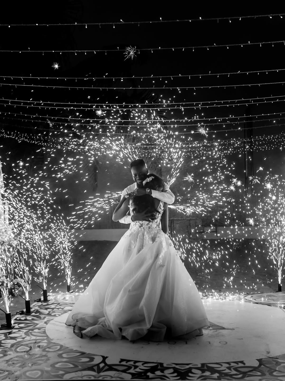 Adekunle Gold and Simi celebrating their 7th wedding anniversary after welcoming twins